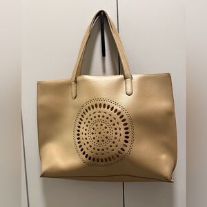 Neiman Marcus Gold Tote with Cut-Out Design